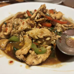 a plate of food with a spoon