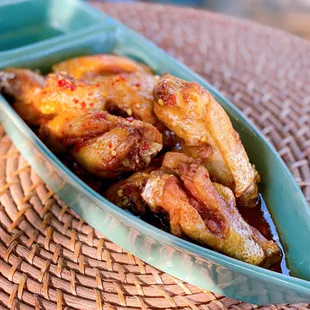 Buffalo Wings : Sweet and Spicy Thai Chili Sauce. Your choice of Spice level ! (Photo shows as Hot)