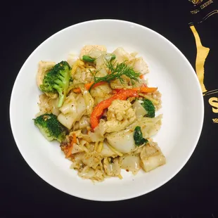 a plate of stir fried vegetables