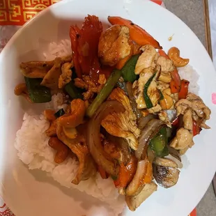 Cashew Chicken with white rice. This is about half the amount they serve for dinner.
