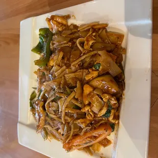 a plate of stir fried noodles
