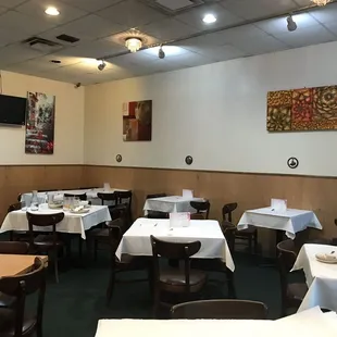 dining area with tables and chairs