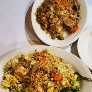 Drunken noodles (top) and Singapore noodles (bottom)