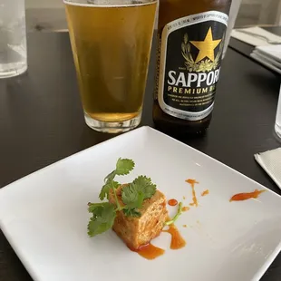 Piece of Tamarind Tofu and beer!