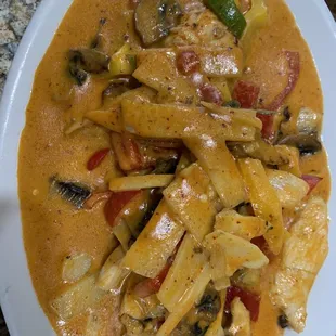 C2. Gang Gai Red Curry - the curry sauce is thick and savory. The perfect amount of sweetness to spice.