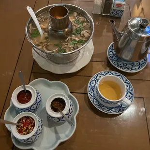 Hot green tea, trio spices and large Tom Yum soup