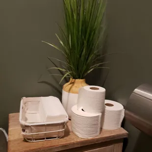 a stack of rolls of toilet paper