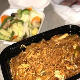 a plate of noodles and vegetables