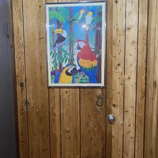 Birds on watch near rest rooms