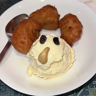 Fried Banana with Vanilla Ice Cream had a cute little face on it