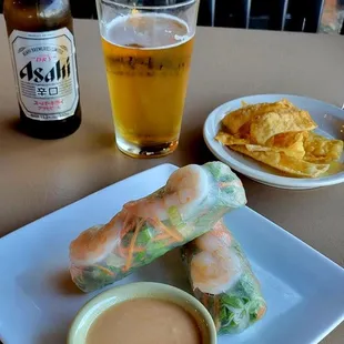 Fresh garden roll with shrimp and Asahi beer.