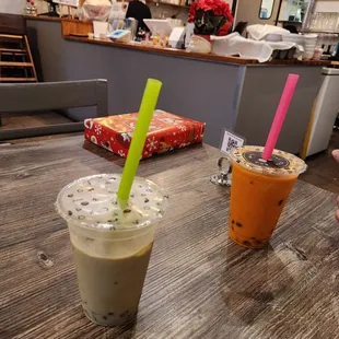 two drinks on a wooden table