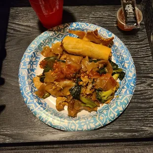 Pad See wee with side of egg roll and crab rangoon