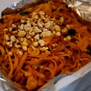 Pad Thai with Pork. Just lift foil from tray, place on grill to reheat or keep warm. convenient!