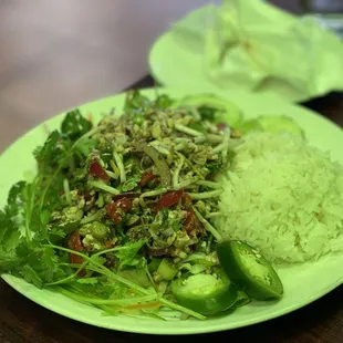 a plate of rice and vegetables