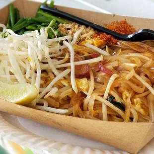 a paper plate of food