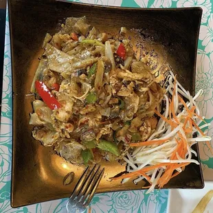 a plate of stir fried vegetables