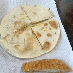 Kids chicken tenders and cheese quesadilla.
