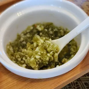 This pickled jalapeño and minced garlic sauce was SO good.  Not spicy but tastes great on everything.