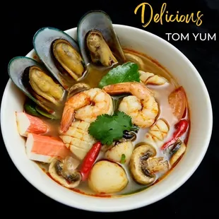 Tom Yum (Lemon glass soup) 
With mushroom, and tomato flavored with fresh herbs in a sour lemon glass broth