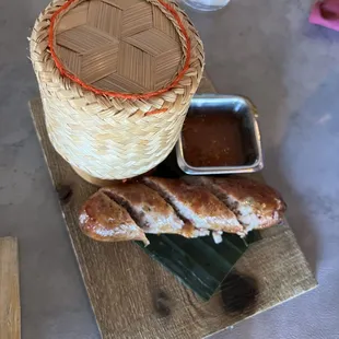 $11 for 1 bland sausage and sticky rice