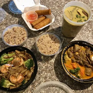 Seafood Green Curry, Beef Panang Curry, Shrimp Pad-See-Ew, Crispy Spring Rolls, and Brown Rice