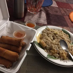 Friend rice with tofu and spring roles.