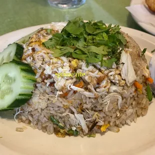 a plate of rice and vegetables