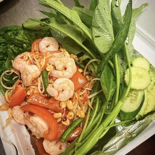 shrimp and vegetables in a styrofoam container