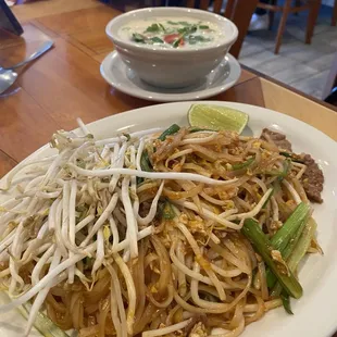 Beef pad Thai and cup of Tom kha