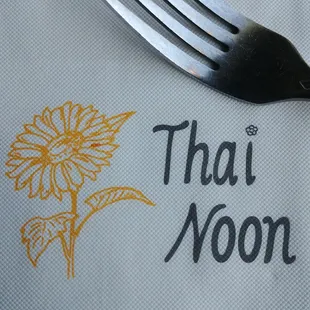 a fork on a napkin