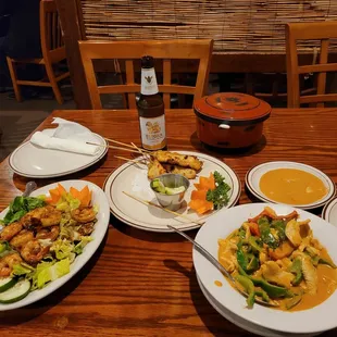 plates of food on a wooden table