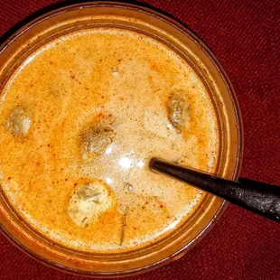 Tom Khar Gai: Mild and delicious chicken soup with coconut milk, galanga, Mushroom, cilantro and lime juice. $6.