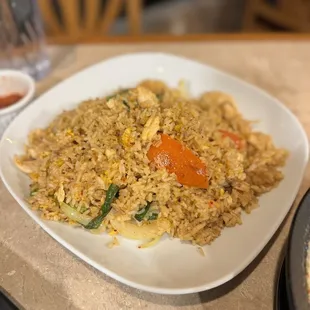 a plate of rice and vegetables