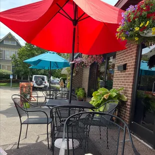 They have a pleasant outdoor seating area with four umbrella covered four tops (seating for four groups of four).