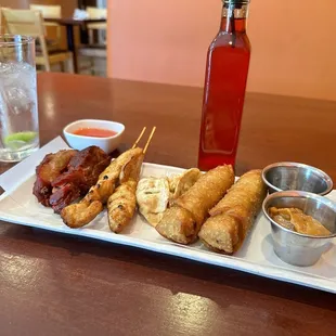 A11. Thai Orange Sampler Plum sauce in the oil container is delicious