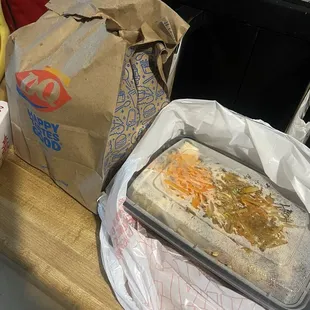 Pad Thai, green curry wrapped in DQ bag???