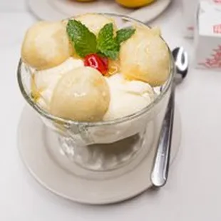 Dessert - Vanilla Ice Cream topped with fried banana and a sweet honey drizzle.