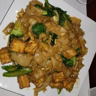 Pad See U....stir fried rice noodle with broccoli,  Chinese broccoli....stir fried in a soy sauce mixture.