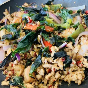 Ground chicken, minced shrimp, and freshly fried crispy basil on top.