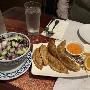 Cucumber salad and vegetable dumplings