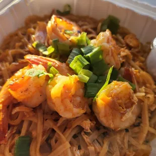 shrimp and noodles in a styrofoam container