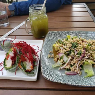 Vegetable Spring Rolls on the left, Chicken Larb Salad on the right  Lemongrass Green Ice Tea