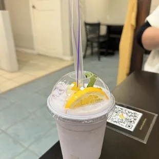 a smoothie in a plastic cup