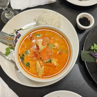 a bowl of soup and rice