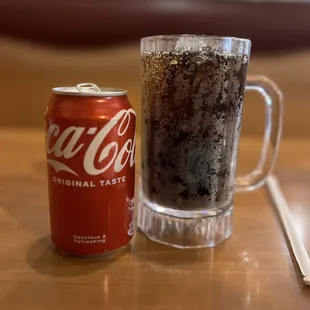 a coke and a glass of soda