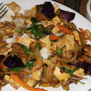 The Eggplant stir fry with soft tofu and steamed rice was good. The peanut sauce for the spring rolls is amazing!