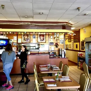 two women talking in a restaurant