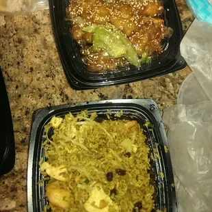 two containers of food on a counter
