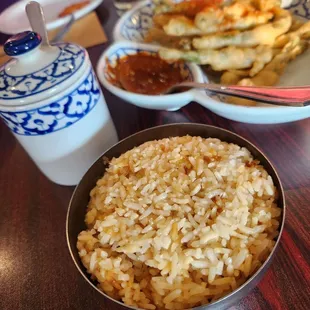 Thai Paradise Pickerington   Moo Gra Tiem 10.95 crispy garlic pork stir-fried with white onions in a black pepper sauce.